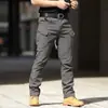 Comércio Exterior Transfronteiriço Roupa de Trabalho Camuflada para Caminhada ao Ar Livre Calças Casuais Masculinas Impermeáveis Elásticas Largas Calças Táticas Versáteis Longas