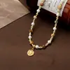 Botella de perfume negra dorada No.5 pedrería pequeño estilo fragante collar alfanumérico para mujer cadena de clavícula moda de lujo ligero clásica