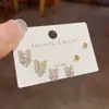 Exquisitos Aretes de Diamante con Moño Doudou de Moda Coreana Versátiles Elegantes Simples Pequeños Súper Brillantes para Mujer
