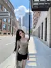 Conjunto de dos piezas de camiseta de manga larga y chaleco de rayas de papel Cher Qiaor
