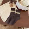 Calcetines de mujer a rayas verdes vintage con botón, calcetines largos de lunares con etiqueta de tela floral estilo japonés, calcetines con volantes de encaje