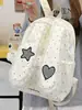 Mochila de orejas caídas de lunares transfronteriza para estudiantes mujeres, nuevo modelo 2026, mochila de nicho de alta apariencia y gran capacidad