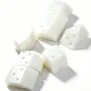 Las almohadillas de nylon blancas son almohadillas de plástico de ingeniería de alta resistencia y resistentes al desgaste para amortiguación y absorción de impactos en equipos mecánicos.