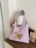 Bolso casual de tela de gran capacidad para mujer, nuevo diseño de moda de verano 2026, bolso de hombro simple, bolsa tote para uso diario
