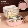Bolsa de cosméticos de viaje de gran capacidad para mujer, diseño minimalista 2026, impermeable, portátil e incluye una bolsa de aseo