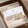 Pendientes de Acero Inoxidable Transfronterizos Europeos y Americanos Más Vendidos para Mujer, Aros Dorados con Forma de Corazón Completamente Diamantados, Set de Tres Piezas de Pendientes de Moda Individualistas
