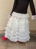 Outono 2026 Novo Estilo Coreano Roupas Infantis Meninas Tops em Camadas Colete com Padrão de Rede Camiseta de Manga Longa Saia de Bolo