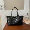 Bolso grande de cuero encerado retro para mujer 2026 nuevo bolso de axila casual de alta gama bolso de hombro plisado para commuting
