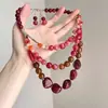 Colar de clavícula com contas vermelhas multicamadas, estilo europeu e americano, com toque de alta qualidade, exagerado e único, colar de estilo étnico em camadas para mulheres