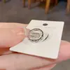 Moda Retro Francesa Estilo Simple Clips Metálicos para Orejas sin Perforación Incrustados con Diamantes con Diseño Único para Mujeres