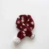 Bufanda de punto a rayas para niños, moderna y linda con pompoms de dibujos animados, un calentador de cuello de invierno elegante y cálido para bebés