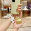 Llavero de Oro Puro 999 Creativo de Moda Colgante de Oro Bolso de Riqueza Diaria Bolsa de la Suerte Encanto Concha de Agua Mismo Estilo