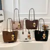Bolso de mano de nicho estilo francés para mujer, nuevo bolso de moda 2026 para ir al trabajo con un toque de alta gama, versátil para el día a día, se puede llevar al hombro o cruzado