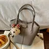 Bolso de mano de nicho estilo coreano transfronterizo para mujer, nuevo bolso tipo cesta de mimbre vintage con patrón de lichi, bolso de hombro y cruzado