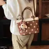 Bolso de mano vintage para mujer, nuevo y popular, de gamuza 2026, bolso cubo exquisito, bolso cruzado de lunares simple y de nicho, moderno