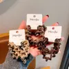 Paquete de 4 Gomas para el Cabello Sencillas con Patrón Ondulado Color Té con Leche, Elásticos Elegantes para el Cabello, Cuerdas Básicas de Alta Elasticidad para Mujeres