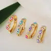 Pendientes de Ojo Maligno Chapados en Oro Real de Cobre de 18 Quilates con Micro Circonio Moda Venta Caliente Sentido de Diseño de Nicho Especial Transfronterizo