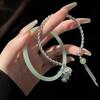 Nova Pulseira Estilo Chinês Estilo Antigo Pulseira Feminina Luxo Leve Design de Nicho Pulseira de Jade Sintético Pulseira Enrolada com Borla