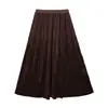 Elegante falda plisada de terciopelo de color liso para mujer, nueva moda versátil de longitud media para otoño e invierno