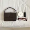 Bolsa de Mão Simples Versátil Casual para Mulheres, Modelo 2026, Atacado Transfronteiriço, Bolsa de Caminhada Estilo Botão para o Dia a Dia, Bolsa Quadrada Pequena de Couro PU Macio