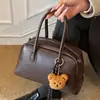 Bolsa de Bowling Retrô Estilo Coreano para Mulheres Outono e Inverno 2025 Nova Moda Bolsa de Ombro de Alto Padrão Bolsa Carteiro Versátil Bolsa Transversal