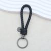 Llavero de cuero trenzado con etiqueta de metal, llavero con logotipo láser, colgante de cuerda de PU antipérdida