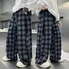Pantalones de Cuadros de Pierna Ancha para Niños Estilo Primavera y Otoño 2026 Nuevo Estilo Niños Medianos y Grandes Sueltos Casuales Estilo Coreano Modernos Largos Ropa de Otoño