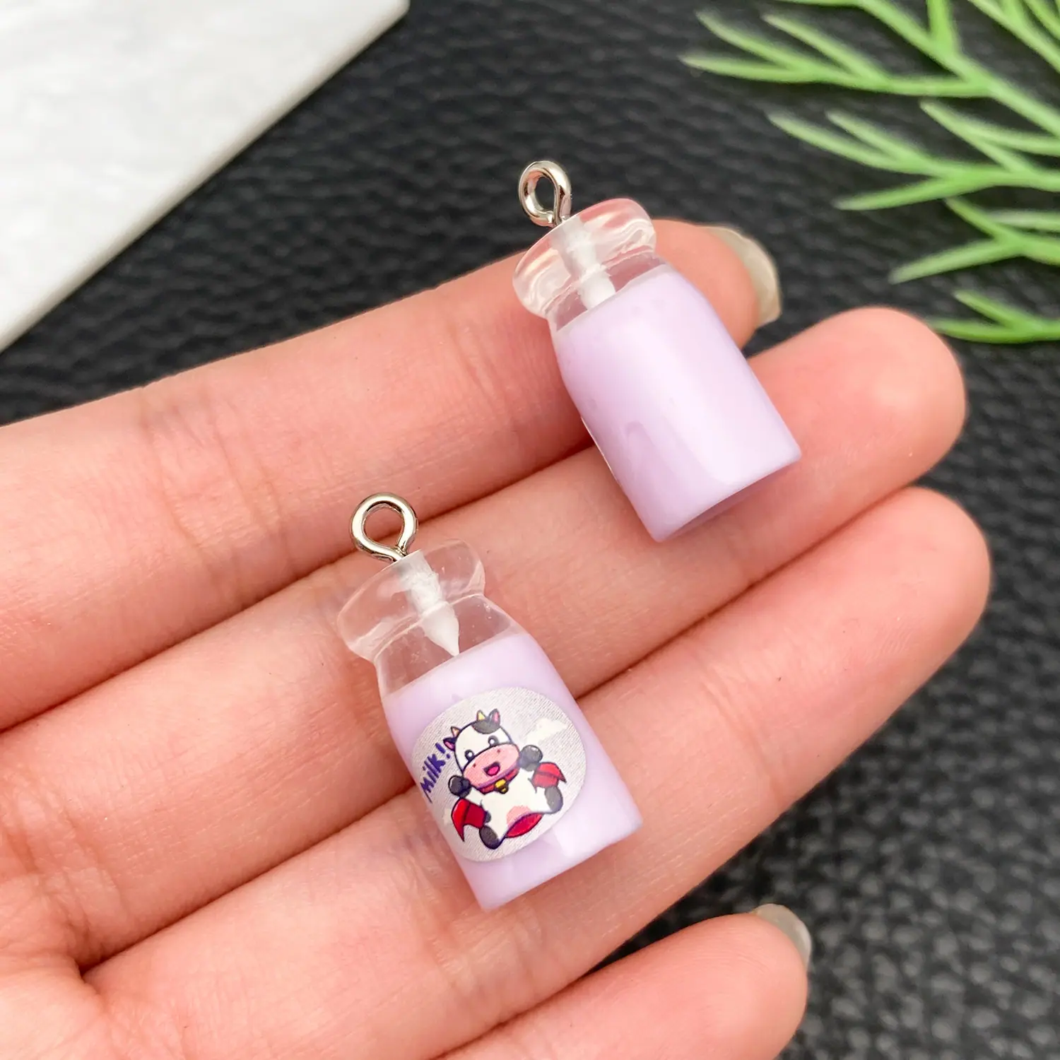 24097-JD3-透明紫色牛奶奶瓶24x11x11mm-1
