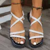 Sandalias planas de estilo coreano con tira para el dedo del pie 43 con tiras cruzadas comercio exterior transfronterizo en stock 35 modelo nuevo moda de verano para playa