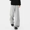 Calça de moletom cinza com fenda e perna larga para homens, cintura alta com costura diagonal, solta e fluida, calça casual de comprimento total com um toque relaxado de estilo de rua