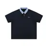 2026 Verano Hombres Estilo Universitario Americano Falso Dos Piezas Cuadros Patchwork Camisa Polo Camiseta de Manga Corta Holgada Moderna