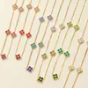 Serie Dopamina Europea y Americana Flor de Cuatro Hojas Acero Inoxidable Chapado en Oro de 18k Zirconia Incrustada Conjunto de Collar y Pulsera para Mujer