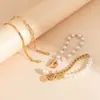 Popular Joyería de Mano Multicapa de Perlas de Imitación Transfronteriza Pulsera con Hebilla de Retrato Set de Joyería de Mano con Cadena Cruzada Personalizada para Mujeres