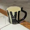 Juego de Taza y Platillo de Cerámica Negra con Gato Original en Relieve y Asa con Cola de Gato Floral Dibujada a Mano Juego de Tazas de Café