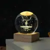 Bola de cristal personalizable grabada con láser 3D con luz nocturna emisora de luz, adorno de cristal de escritorio y decoración que realza el ambiente