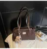 Bolso de Mano Retro Transfronterizo para Mujer 2025 Invierno Nuevo de Alta Calidad Lujo Ligero Patchwork Bolso de Hombro Axila