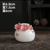 Textura de porcelana de hueso Porcelana blanca de Dehua Flores pellizcadas hechas a mano Entrada de la sala Gabinete de vinos Gabinete de TV Uso diario en el hogar Plantas verdes Arreglo floral