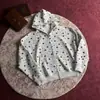 Sudadera con capucha gris claro y estampado integral de estrellas para hombre, nuevo estilo de otoño, holgada, casual, versátil, sudadera para pareja