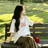 Camiseta de verano de manga corta para mujer, superventas transfronteriza, estilo casual perezoso con estampado estilo coreano, camiseta básica versátil y transpirable, femenina, moderna