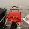 Bolsa Feminina Fresca e Simples 2025 Primavera/Verão Nova Bolsa Pequena Quadrada com Fecho Bolsa Transversal de Ombro Único Simples de Alto Nível Estilo Coreano