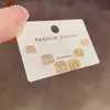 Moda Japonesa Coreana Simple Circonita Letra M Pendientes de Botón de Tres Piezas Exquisitos Pequeños Versátiles Tacto de Alta Gama Pendientes Súper Brillantes para Mujeres