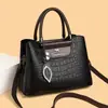 Bolsa feminina de cor sólida, simples e estilosa, novo modelo 2026, couro PU, transfronteiriça, de ombro, crossbody, bolsa de mão, bolsa tote de grande capacidade