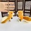Máquina de Garra de 4 pulgadas al por mayor Juguetes de Peluche Premium Llaveros Colgantes Pequeños Lindos