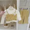 Bolo de creme Leenbaby! Conjunto original de duas peças para meninas: top amarelo de bolinhas e calça amarela pantalona