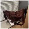 Bolsa de leopardo de nicho super popular para mulheres, nova bolsa transversal versátil da moda 2026, mini bolsa de chifre requintada, bolsa de bolinho