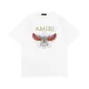 24SS Marca de moda transfronteriza europea y americana amri Peace Pigeon Camiseta casual de manga corta con estampado para hombres y mujeres Camiseta de primavera de media manga de calle americana
