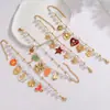 Pulsera de Perlas Estilo Nuevo Retro Europeo y Americano Colgante de Acero Inoxidable Corazón Estrella Joyería de Lujo Ligero de Gama Alta Venta al por Mayor