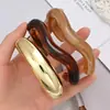 Accesorio transfronterizo de gran venta, producto nuevo: brazalete abierto de forma de ola irregular para mujer, conjunto de tres piezas personalizado y de moda de joyería para mujer