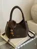 Bolsas de Nicho Exquisitas e Modernas para Mulheres 2025 Nova Moda Versátil Bolsa Transversal com Corrente com um Toque de Luxo Bolsa Feminina