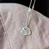 Colgante de Nube Auspiciosa Ruyi Lock de Calcedonia Blanca Hielo Natural Ágata Candado de Paz Ornamento de Jadeíta Popular Suministro para Transmisión en Vivo